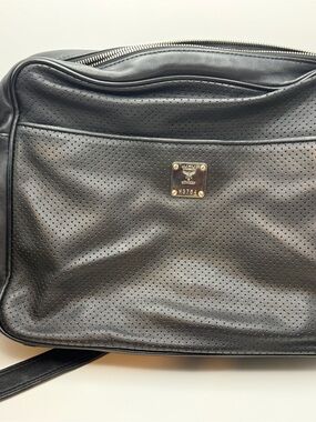 MCM Black Perforated Leather Messenger Bag with Gold Plaque